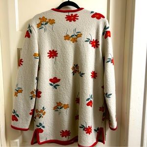 Vintage Geiger Sweater with Red and Yellow flowers on a Cream background. Wool